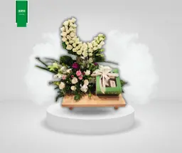 Wooden stand with a bouquet of natural roses and chocolates